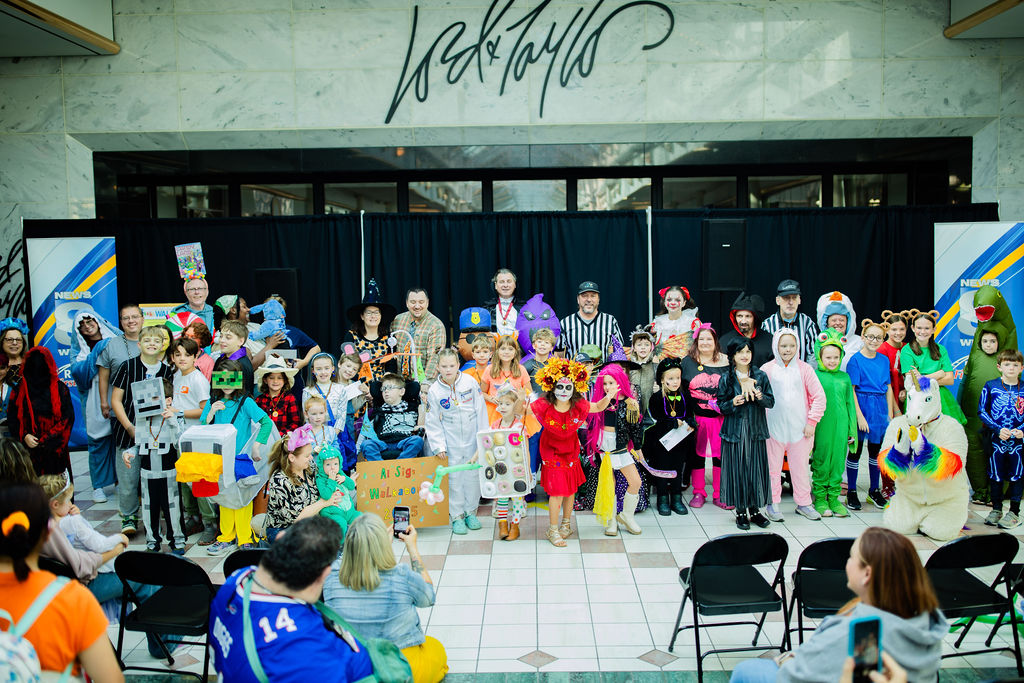 photo of everyone who took part in the costume contest gathered together